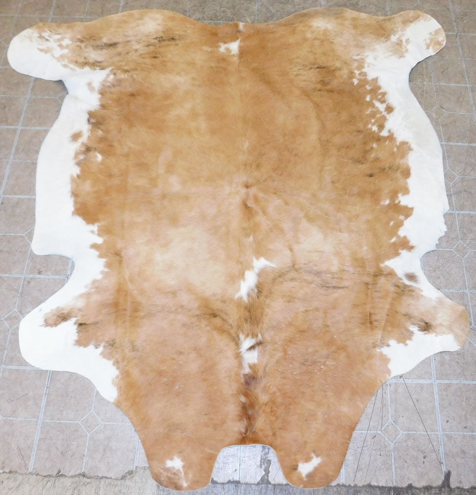 6' x 5' 1" Cow Hyde Rug: 6' x 5' 1" Cow Hyde Rug . "ALL DESCRIPTIONS AND ANY CONDITION STATEMENT GIVEN BY LANGSTON AUCTION GALLERY ARE STRICTLY OPINIONS AND LANGSTON'S SHALL HAVE NO RESPONSIBILITY FOR ERRORS OR OMISSIONS.