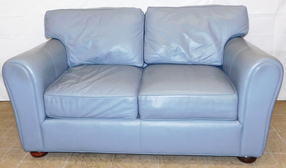 Leather Upholstered Loveseat by Leather Mark, Hickory, NC: Leather Upholstered Loveseat by Leather Mark, Hickory, NC. 36 1/2" H 64" W 38" D "ALL DESCRIPTIONS AND ANY CONDITION STATEMENT GIVEN BY LANGSTON AUCTION GALLERY ARE STRICTLY OPINIONS AND LANGSTON'S
