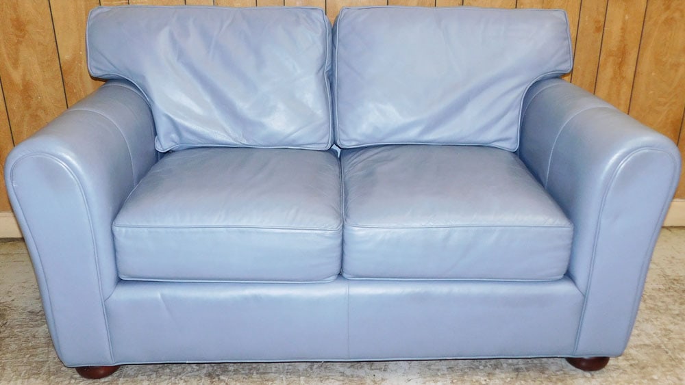 Leather Upholstered Loveseat by Leather Mark, Hickory, NC: Leather Upholstered Loveseat by Leather Mark, Hickory, NC. 36 1/2" H 64" W 38" D "ALL DESCRIPTIONS AND ANY CONDITION STATEMENT GIVEN BY LANGSTON AUCTION GALLERY ARE STRICTLY OPINIONS AND LANGSTON'S