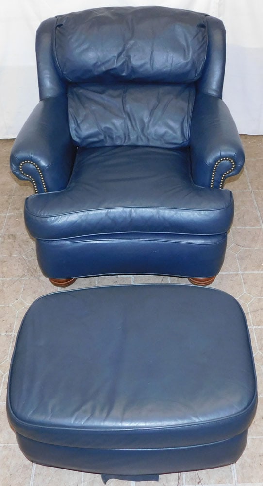 Leather Arm Chair & Ottoman by Distinction: Leather Arm Chair & Ottoman by Distinction . 33" H 34" W 41" D "ALL DESCRIPTIONS AND ANY CONDITION STATEMENT GIVEN BY LANGSTON AUCTION GALLERY ARE STRICTLY OPINIONS AND LANGSTON'S SHALL HAVE NO