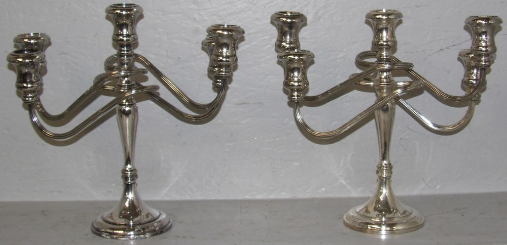 Pair of Silverplated Five Light Candelabras: Pair of Silverplated Five Light Candelabras. 12" H 12 1/4" Dia. "ALL DESCRIPTIONS AND ANY CONDITION STATEMENT GIVEN BY LANGSTON AUCTION GALLERY ARE STRICTLY OPINIONS AND LANGSTON'S SHALL HAVE NO
