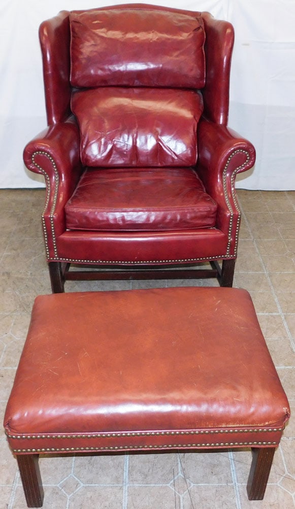 Leather Upholstered Wing Back Arm Chair & Ottoman, (Classic Leather & Old Hickory Tannery): Leather Upholstered Wing Back Arm Chair & Ottoman, (Classic Leather & Old Hickory Tannery). 41" H 33" W 35" D "ALL DESCRIPTIONS AND ANY CONDITION STATEMENT GIVEN BY LANGSTON AUCTION GALLERY ARE