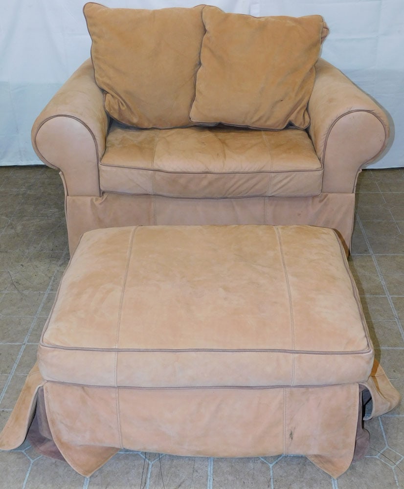 Leather Upholstered Chair & Ottoman by Thomasville: Leather Upholstered Chair & Ottoman by Thomasville . 27 1/2" H 49" W 37" D "ALL DESCRIPTIONS AND ANY CONDITION STATEMENT GIVEN BY LANGSTON AUCTION GALLERY ARE STRICTLY OPINIONS AND LANGSTON'S SHALL HA