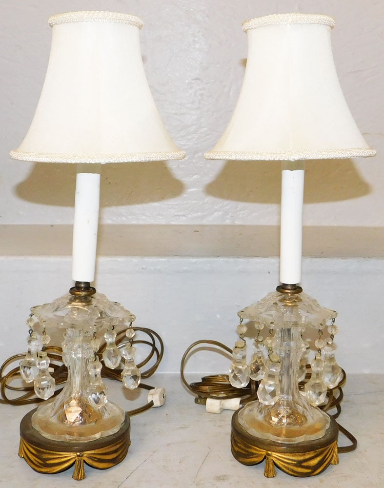 Pair of Cut Crystal & Brass Base Lamps: Pair of Cut Crystal & Brass Base Lamps . 16" H 4 1/4" Dia. "ALL DESCRIPTIONS AND ANY CONDITION STATEMENT GIVEN BY LANGSTON AUCTION GALLERY ARE STRICTLY OPINIONS AND LANGSTON'S SHALL HAVE NO