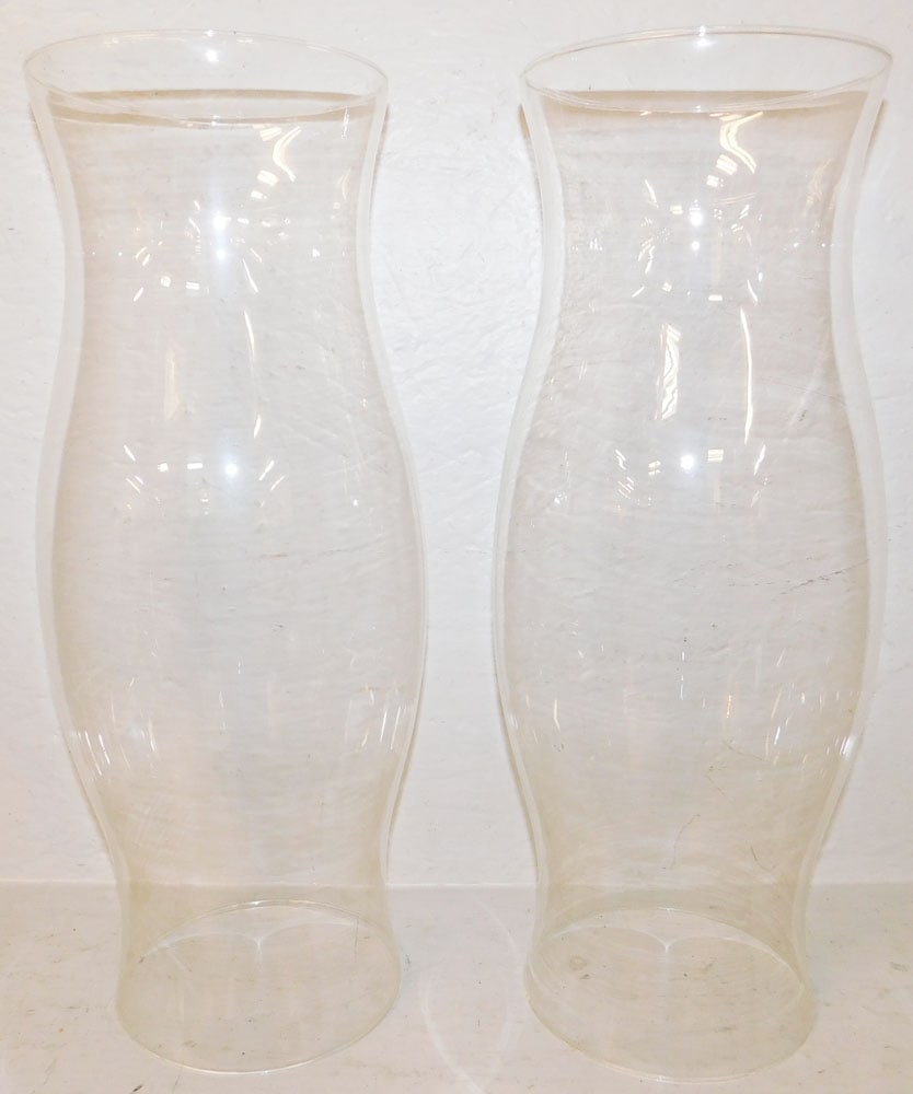 Pair of Glass Hurricane Shades: Pair of Glass Hurricane Shades . 19 3/4" H 7 1/2" Dia. "ALL DESCRIPTIONS AND ANY CONDITION STATEMENT GIVEN BY LANGSTON AUCTION GALLERY ARE STRICTLY OPINIONS AND LANGSTON'S SHALL HAVE NO