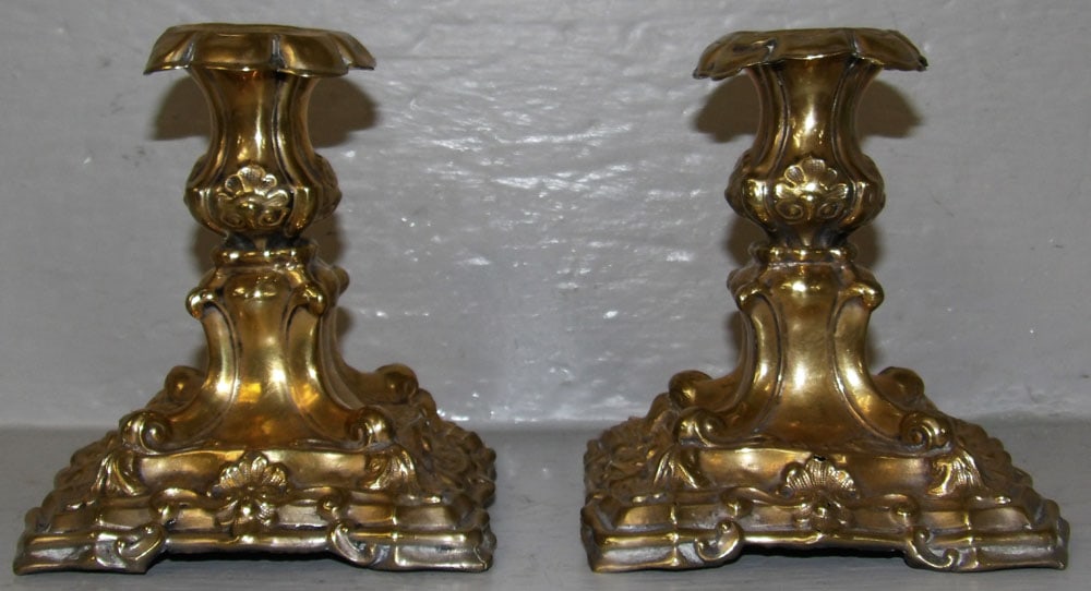 Pair of Antique Embossed Brass Candlesticks: Pair of Antique Embossed Brass Candlesticks . 5" H 4 1/2" Dia. "ALL DESCRIPTIONS AND ANY CONDITION STATEMENT GIVEN BY LANGSTON AUCTION GALLERY ARE STRICTLY OPINIONS AND LANGSTON'S SHALL HAVE NO