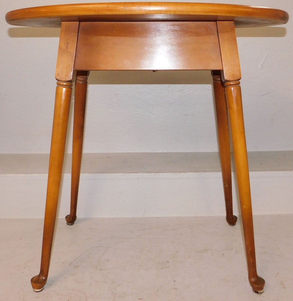 Bench Made Cherry Oval Top Stand: Bench Made Cherry Oval Top Stand . 24" H 25 1/2" W 16" D "ALL DESCRIPTIONS AND ANY CONDITION STATEMENT GIVEN BY LANGSTON AUCTION GALLERY ARE STRICTLY OPINIONS AND LANGSTON'S SHALL HAVE NO