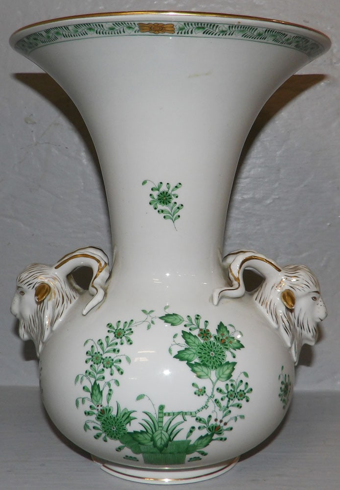 Herend Porcelain Vase with Ram Head Handles, (Chip on Base): Herend Porcelain Vase with Ram Head Handles, (Chip on Base). 10 1/2" H 8" W "ALL DESCRIPTIONS AND ANY CONDITION STATEMENT GIVEN BY LANGSTON AUCTION GALLERY ARE STRICTLY OPINIONS AND LANGSTON'S SHALL