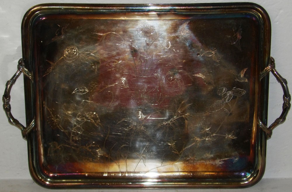 Silverplated Serving Tray: Silverplated Serving Tray. 25" x 17" "ALL DESCRIPTIONS AND ANY CONDITION STATEMENT GIVEN BY LANGSTON AUCTION GALLERY ARE STRICTLY OPINIONS AND LANGSTON'S SHALL HAVE NO RESPONSIBILITY FOR ERRORS OR