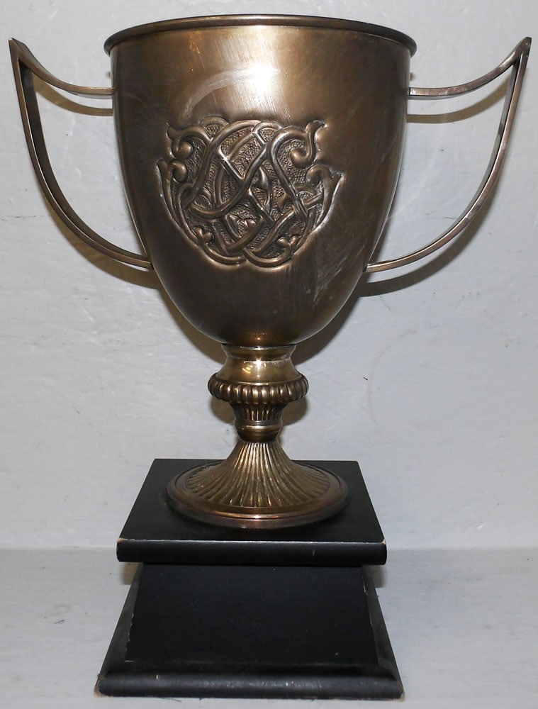 Silverplated Trophy on Painted Base: Silverplated Trophy on Painted Base. 13 1/4" H 11 3/4" W "ALL DESCRIPTIONS AND ANY CONDITION STATEMENT GIVEN BY LANGSTON AUCTION GALLERY ARE STRICTLY OPINIONS AND LANGSTON'S SHALL HAVE NO
