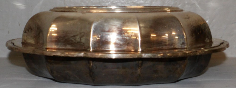 Silverplated Covered Dish by Tiffany & Co.: Silverplated Covered Dish by Tiffany & Co.. 11" W 8 1/4" D "ALL DESCRIPTIONS AND ANY CONDITION STATEMENT GIVEN BY LANGSTON AUCTION GALLERY ARE STRICTLY OPINIONS AND LANGSTON'S SHALL HAVE NO RESPONSIBI