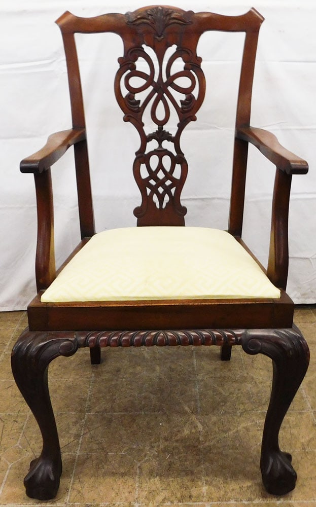 Antique Carved Mahogany Arm Chair with Ball & Claw Feet: Antique Carved Mahogany Arm Chair with Ball & Claw Feet. 40" H 23 1/2" W 23 1/2" D "ALL DESCRIPTIONS AND ANY CONDITION STATEMENT GIVEN BY LANGSTON AUCTION GALLERY ARE STRICTLY OPINIONS AND LANGSTON'S