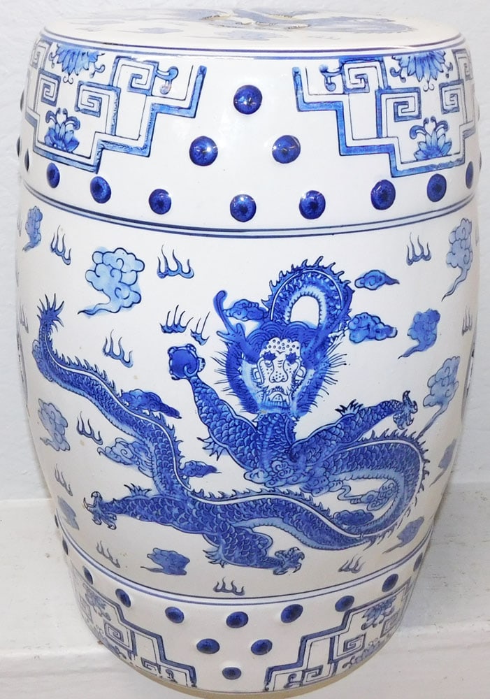 Oriental Porcelain Blue & White Garden Seat with Dragon Motif: Oriental Porcelain Blue & White Garden Seat with Dragon Motif. 18" H 12 1/4" Dia. "ALL DESCRIPTIONS AND ANY CONDITION STATEMENT GIVEN BY LANGSTON AUCTION GALLERY ARE STRICTLY OPINIONS AND LANGSTON'S