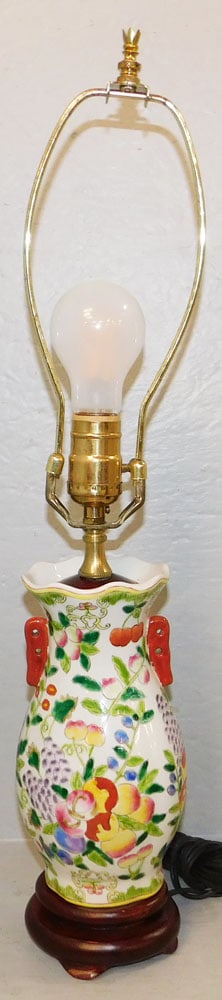 Oriental Painted Porcelain Vase Made Into Lamp: Oriental Painted Porcelain Vase Made Into Lamp . 23" H 4 1/2" W "ALL DESCRIPTIONS AND ANY CONDITION STATEMENT GIVEN BY LANGSTON AUCTION GALLERY ARE STRICTLY OPINIONS AND LANGSTON'S SHALL HAVE NO