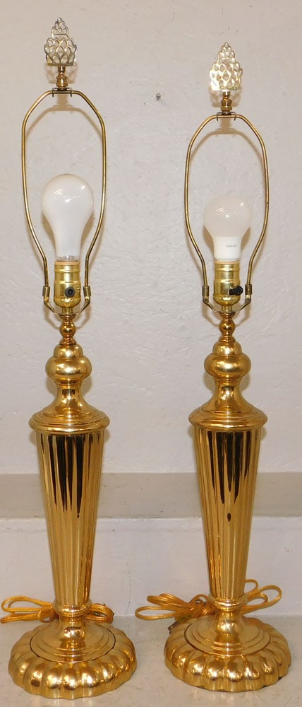 Pair of Brass Lamps: Pair of Brass Lamps . 32 1/4" H 6 1/4" Dia. "ALL DESCRIPTIONS AND ANY CONDITION STATEMENT GIVEN BY LANGSTON AUCTION GALLERY ARE STRICTLY OPINIONS AND LANGSTON'S SHALL HAVE NO RESPONSIBILITY FOR