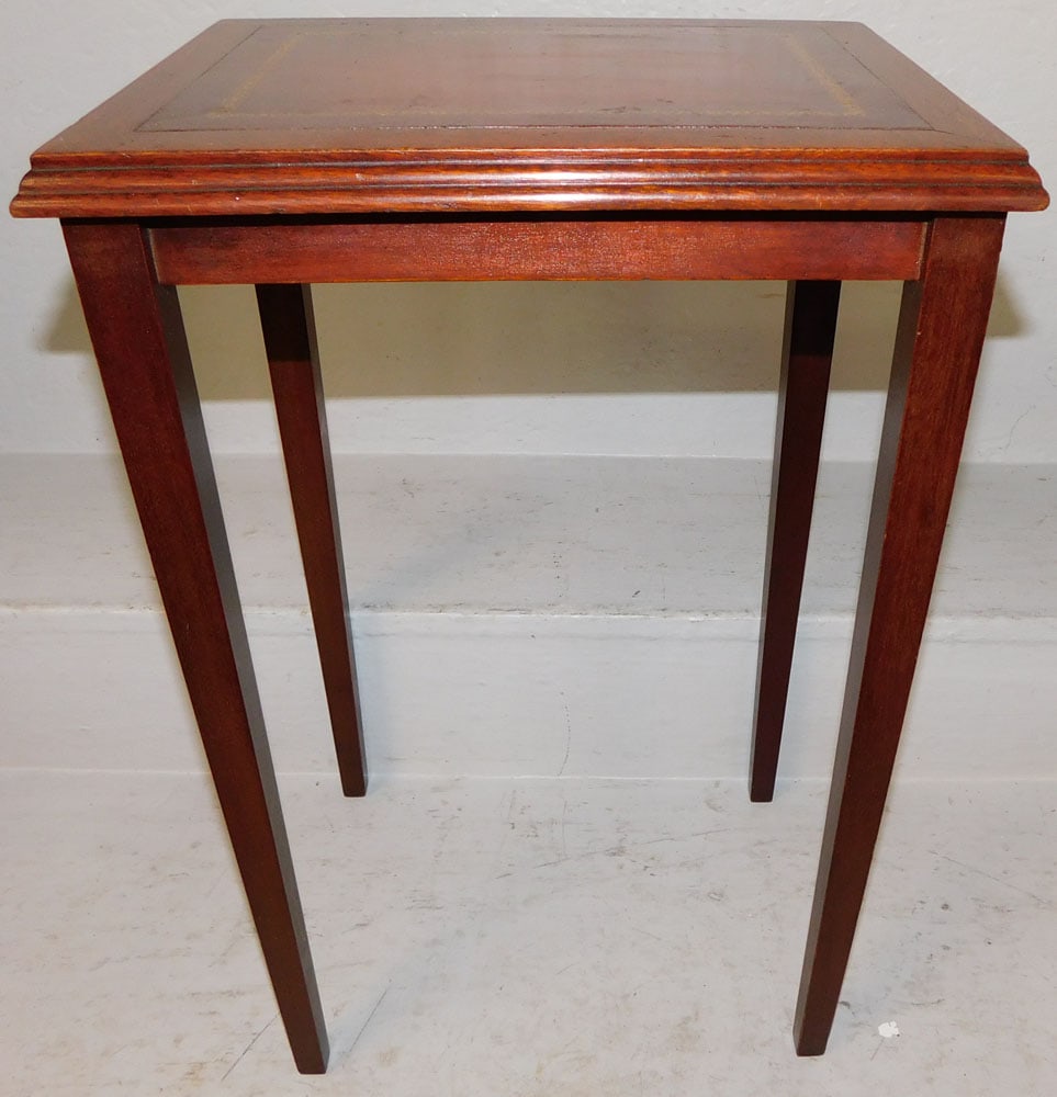 Mahogany & Leather Top Stand: Mahogany & Leather Top Stand . 21" H 14" W 11 1/4" D "ALL DESCRIPTIONS AND ANY CONDITION STATEMENT GIVEN BY LANGSTON AUCTION GALLERY ARE STRICTLY OPINIONS AND LANGSTON'S SHALL HAVE NO RESPONSIBILITY