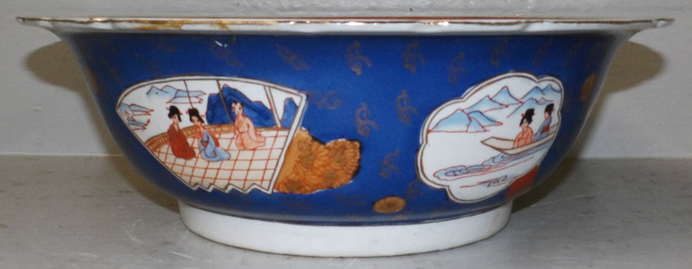 Oriental Porcelain Bowl, (Small Restoration): Oriental Porcelain Bowl, (Small Restoration). 5" H 15 1/2" Dia. "ALL DESCRIPTIONS AND ANY CONDITION STATEMENT GIVEN BY LANGSTON AUCTION GALLERY ARE STRICTLY OPINIONS AND LANGSTON'S SHALL HAVE NO