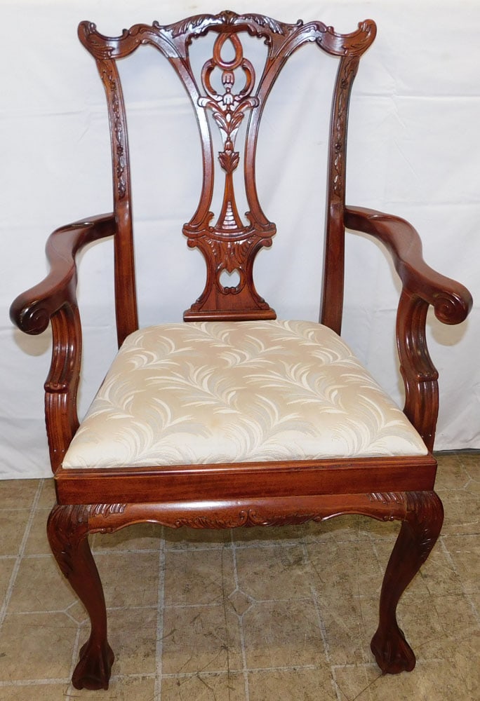 Carved Mahogany Chippendale Style Arm Chair with Ball & Claw Feet: Carved Mahogany Chippendale Style Arm Chair with Ball & Claw Feet. 40 1/4" H 25" W 22" D "ALL DESCRIPTIONS AND ANY CONDITION STATEMENT GIVEN BY LANGSTON AUCTION GALLERY ARE STRICTLY OPINIONS AND LANGS
