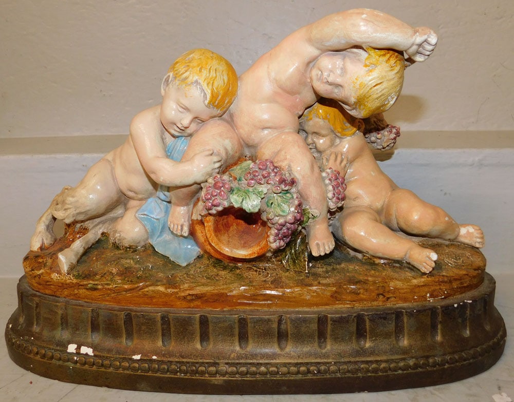 Painted Ceramic Putti Centerpiece Marked Calendi: Painted Ceramic Putti Centerpiece Marked Calendi . 10 1/2" H 17 1/2" W 7" D "ALL DESCRIPTIONS AND ANY CONDITION STATEMENT GIVEN BY LANGSTON AUCTION GALLERY ARE STRICTLY OPINIONS AND LANGSTON'S SHALL