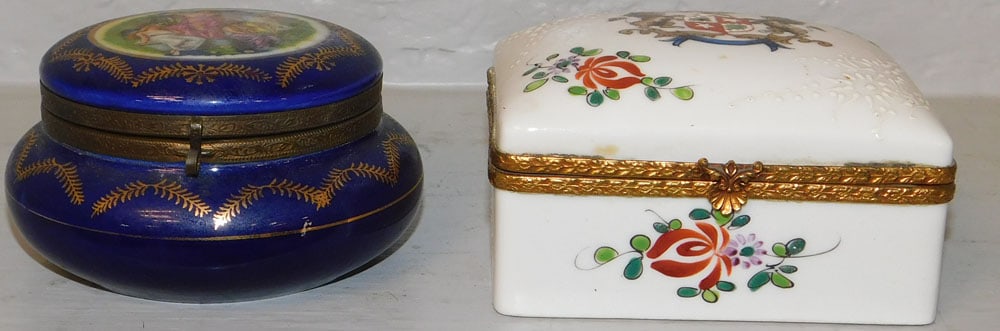 Two Painted Porcelain Dresser Boxes: Two Painted Porcelain Dresser Boxes . Up to 2 1/4" H 4 1/4" W 3 1/2" D "ALL DESCRIPTIONS AND ANY CONDITION STATEMENT GIVEN BY LANGSTON AUCTION GALLERY ARE STRICTLY OPINIONS AND LANGSTON'S SHALL HAVE