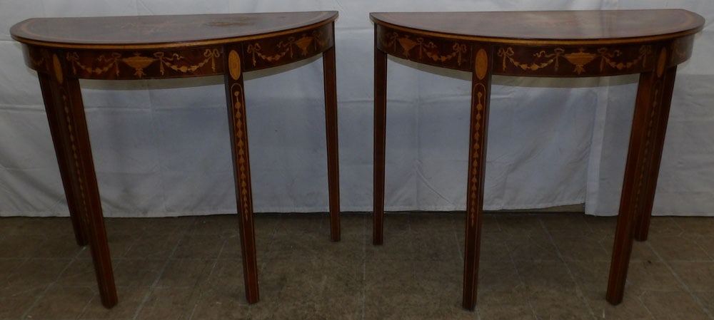 Pair of Mahogany Bell Flower & Urn Inlaid Demi Lune Consoles: Pair of Mahogany Bell Flower & Urn Inlaid Demi Lune Consoles . 29 1/4" H 35 3/4" W 18" D "ALL DESCRIPTIONS AND ANY CONDITION STATEMENT GIVEN BY LANGSTON AUCTION GALLERY ARE STRICTLY OPINIONS AND