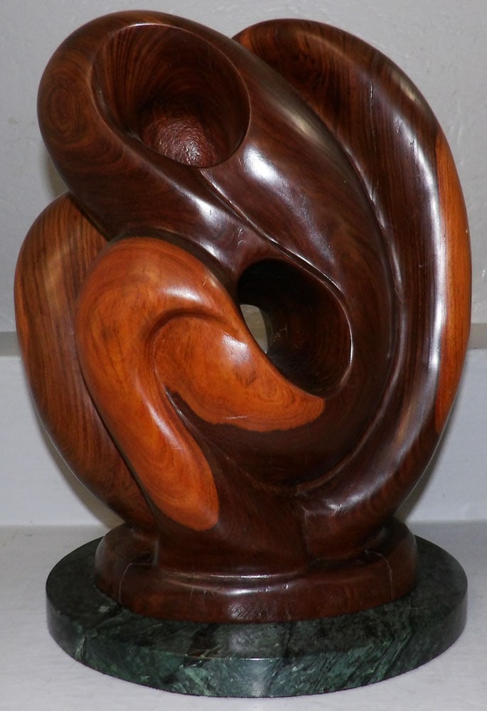 Modern Carved Rosewood Sculpture on Marble Base: Modern Carved Rosewood Sculpture on Marble Base . 15 1/2" H 11" Dia. "ALL DESCRIPTIONS AND ANY CONDITION STATEMENT GIVEN BY LANGSTON AUCTION GALLERY ARE STRICTLY OPINIONS AND LANGSTON'S SHALL HAVE NO 