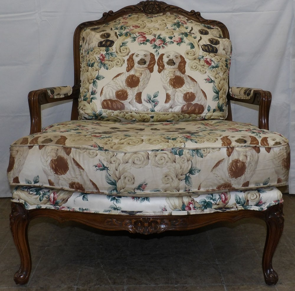 Carved Walnut Oversized Fauteuil with Spaniel Motif Upholstery: Carved Walnut Oversized Fauteuil with Spaniel Motif Upholstery. 37 1/2" H 32 3/4" W 37" D "ALL DESCRIPTIONS AND ANY CONDITION STATEMENT GIVEN BY LANGSTON AUCTION GALLERY ARE STRICTLY OPINIONS AND LANG