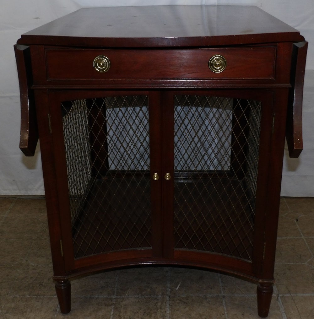 Mahogany Inlaid & Wire Mesh Drop Leaf Stand by Baker: Mahogany Inlaid & Wire Mesh Drop Leaf Stand by Baker. 29 1/4" H 24" W 30" D "ALL DESCRIPTIONS AND ANY CONDITION STATEMENT GIVEN BY LANGSTON AUCTION GALLERY ARE STRICTLY OPINIONS AND LANGSTON'S SHALL