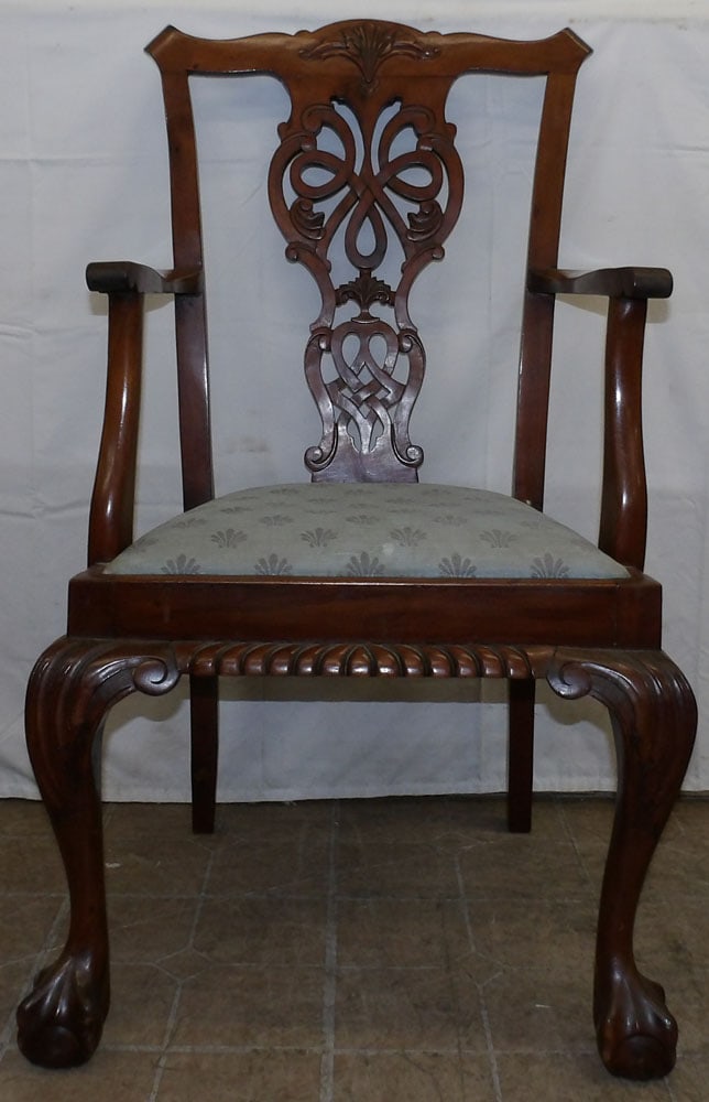 Antique Carved Mahogany Arm Chair with Ball & Claw Feet: Antique Carved Mahogany Arm Chair with Ball & Claw Feet. 40 1/2" H 23" W 21" D "ALL DESCRIPTIONS AND ANY CONDITION STATEMENT GIVEN BY LANGSTON AUCTION GALLERY ARE STRICTLY OPINIONS AND LANGSTON'S