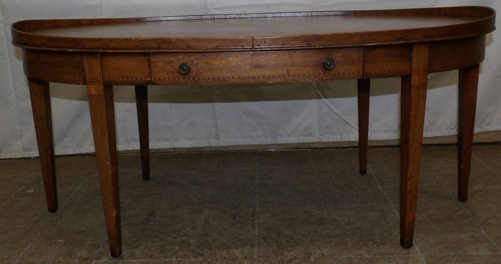 Oval Mahogany Inlaid Tea Table with One Drawer: Oval Mahogany Inlaid Tea Table with One Drawer. 17" H 38 1/4" W 19 3/4" D "ALL DESCRIPTIONS AND ANY CONDITION STATEMENT GIVEN BY LANGSTON AUCTION GALLERY ARE STRICTLY OPINIONS AND LANGSTON'S SHALL HAV