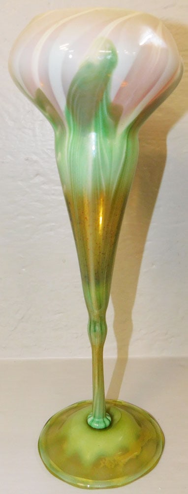 Antique Floriform Irridescent Art Glass Vase Marked & Numbered by Louis Comfort Tiffany: Antique Floriform Irridescent Art Glass Vase Marked & Numbered by Louis Comfort Tiffany. 12 3/4" H 4 1/2" Dia. "ALL DESCRIPTIONS AND ANY CONDITION STATEMENT GIVEN BY LANGSTON AUCTION GALLERY ARE STRIC