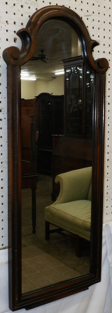 Antique Walnut Framed Mirror: Antique Walnut Framed Mirror. 37" x 15 1/4" ALL DESCRIPTIONS AND ANY CONDITION STATEMENT GIVEN BY LANGSTON AUCTION GALLERY ARE STRICTLY OPINIONS AND LANGSTON'S SHALL HAVE NO RESPONSIBILITY FOR ERRORS 