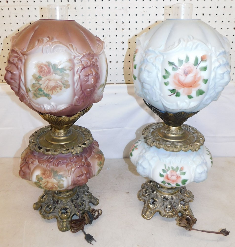 Two Hand Painted & Gilded Metal Gone with the Wind Lamps with Lion Faces: Two Hand Painted & Gilded Metal Gone with the Wind Lamps with Lion Faces . 25" H 10 1/2" Dia. ALL DESCRIPTIONS AND ANY CONDITION STATEMENT GIVEN BY LANGSTON AUCTION GALLERY ARE STRICTLY OPINIONS AND L
