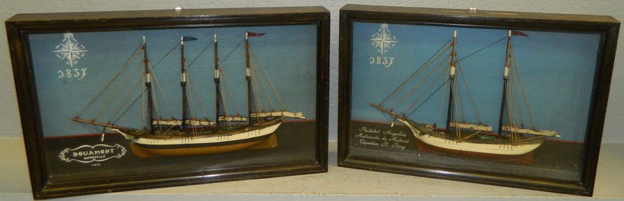 Pair of ship models in shadow box frames.: Pair of ship models in shadow box frames. 17 1/2" wide x 12" tall.