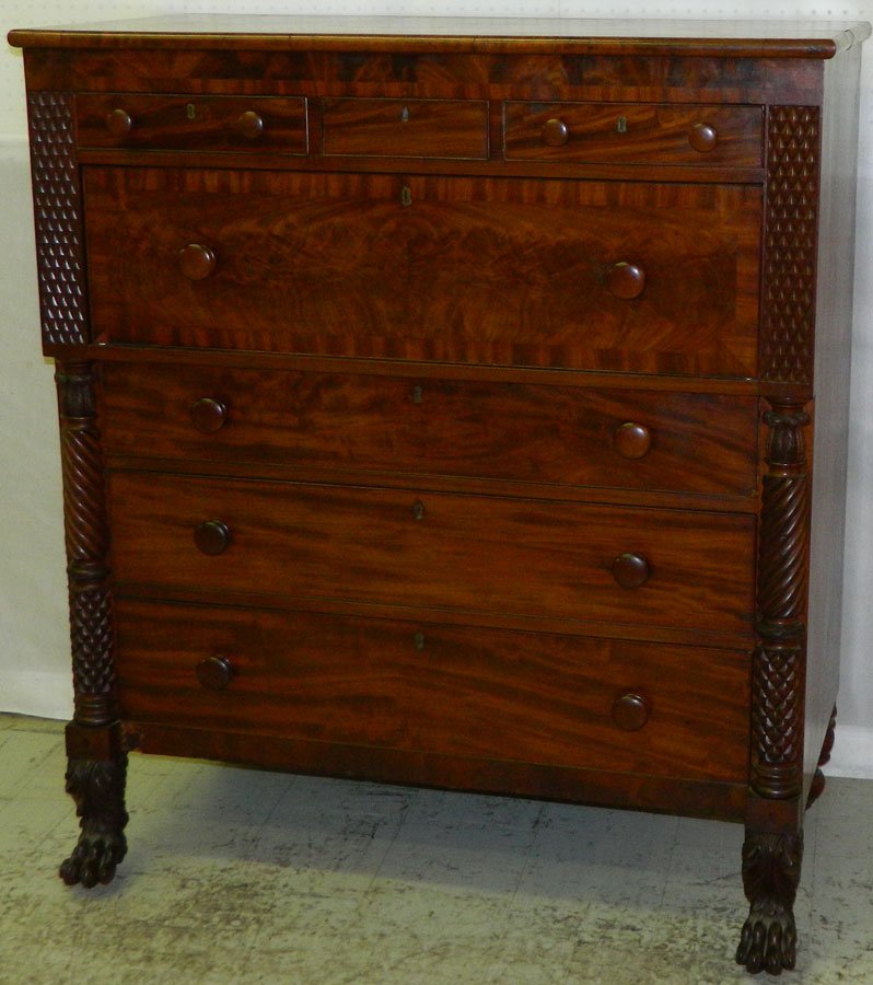 Empire mah butler's desk with claw feet.: Empire mahogany butler's desk with claw feet, carved pineapple turnings, and tooled leather interior. 46" wide x 23" deep x 52 1/4" tall.