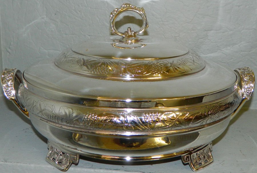 Pairpoint silver plate covered vegetable dish.: Pairpoint silver plate footed covered vegetable dish. 12 1/2" diameter x 6 1/2" tall.