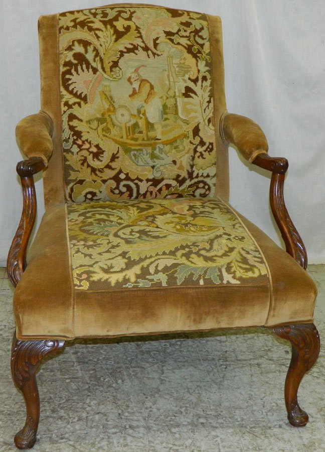 Turn of the century QA needlepoint lolling chair.: Beautiful turn of the century Queen Anne carved needlepoint lolling chair.