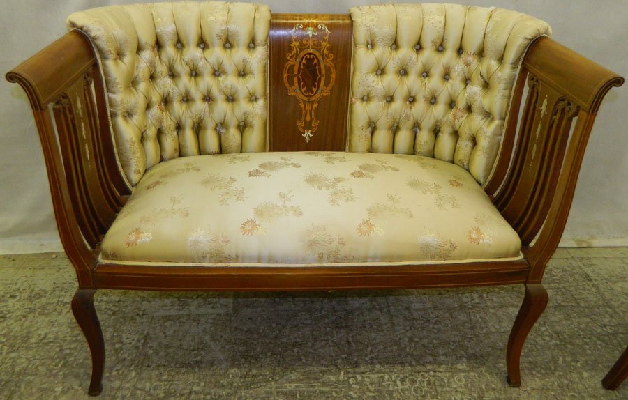 French two seat mahogany settee.: French two seat mahogany settee with mother of pearl and marquetry inlay.
