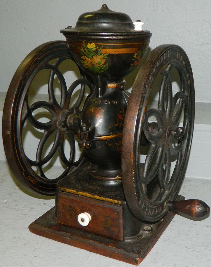 Two wheel coffee grinder by Enterprise.: Two wheel coffee grinder by Enterprise. 13 1/4" wide x 13" deep x 17 1/2" tall.