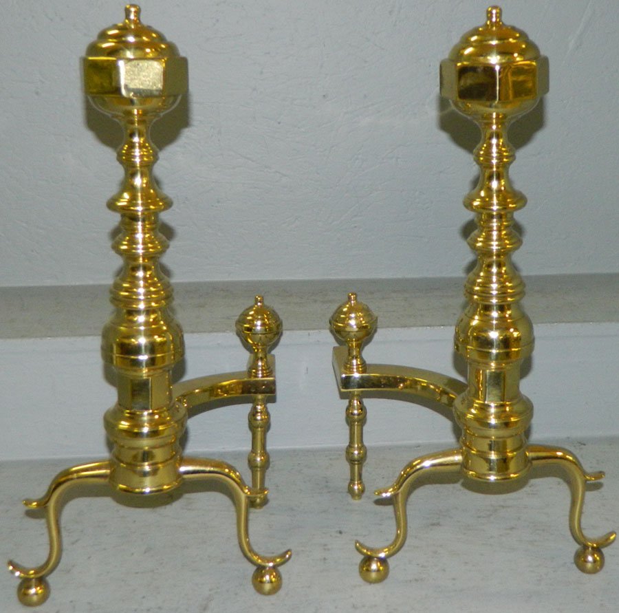 Pair of cast brass andirons.: Pair of cast brass andirons, cut to fit gas logs from a Greenville estate. 21" tall.