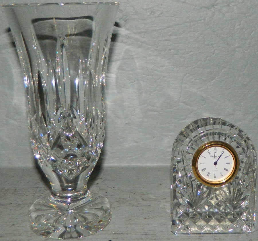 Waterford vase and a Waterford clock.: Waterford vase and a Waterford clock. Vase 7" tall, clock 3 1/2" tall.