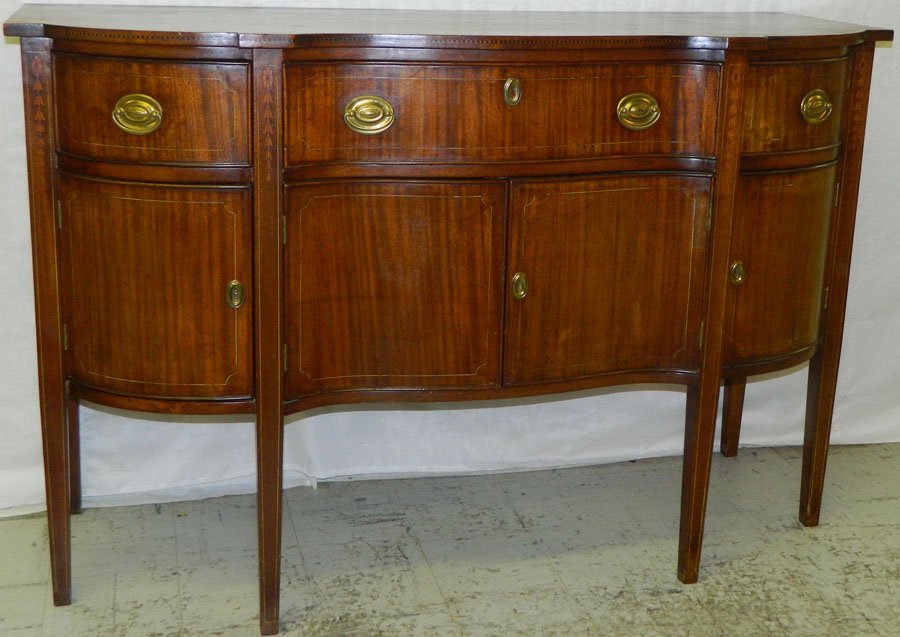 Inlaid HW mah serpentine front sideboard.: Inlaid Hepplewhite mahogany serpentine front sideboard, cira 1860-1870. 60 1/2" long x 23 1/2" deep x 39 1/2" tall.