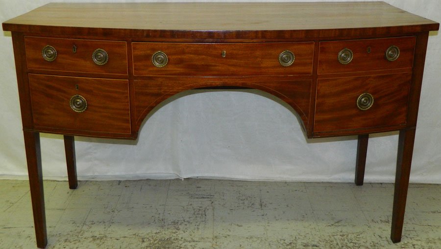 Inlaid bowfront mah Hepplewhite sideboard.: Inlaid bowfront mahogany Hepplewhite sideboard with cellarette drawer, circa 1830. 60 1/2" wide x 27" deep x 36 1/4" tall.