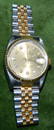Rolex two-tone diamond quick set watch.