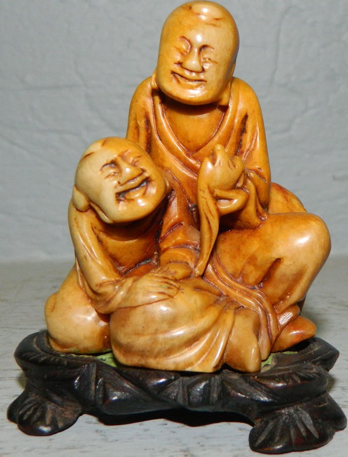 Oriental soapstone figure on stand.: Oriental soapstone figure on stand. 3 1/2" tall.