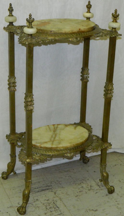 Two tier marble and metal victorian stand.: Two tier marble and metal victorian stand. 18" wide x 12 1/2" deep x 32 1/2" tall.