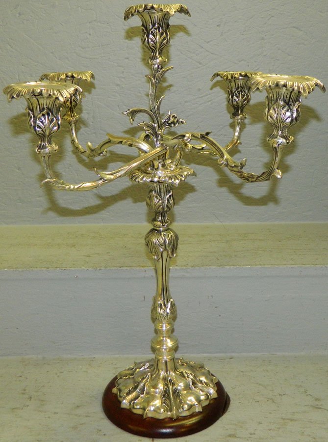 Five branch silver plate candelabra.: Five branch silver plate candelabra. 21" tall.