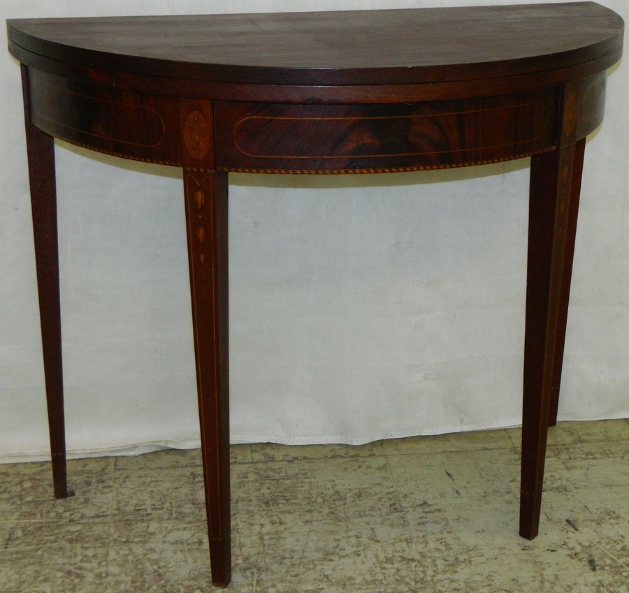 Inlaid mah Hepplewhite fold over game table.: Inlaid mahogany Hepplewhite fold over game table. 36 1/4" x 18" x 29 3/4" tall.