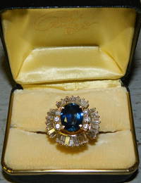 Lady's blue sapphire & diamond ring (tested 18K)