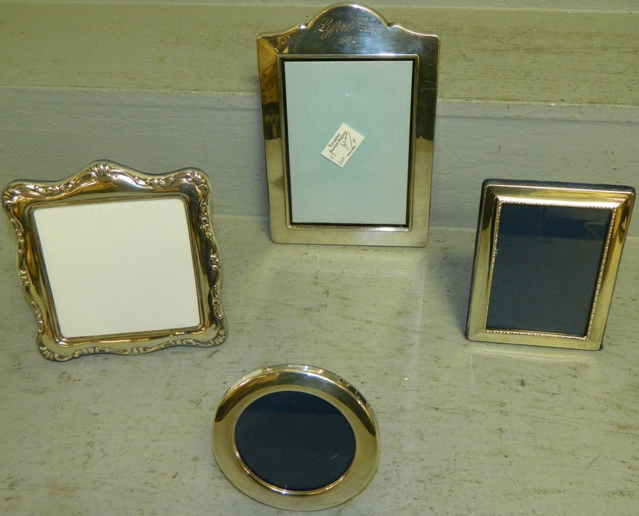 (4) English sterling hallmarked picture frames.: (4) English sterling hallmarked picture frames. 4 1/2" - 9 1/2" tall.